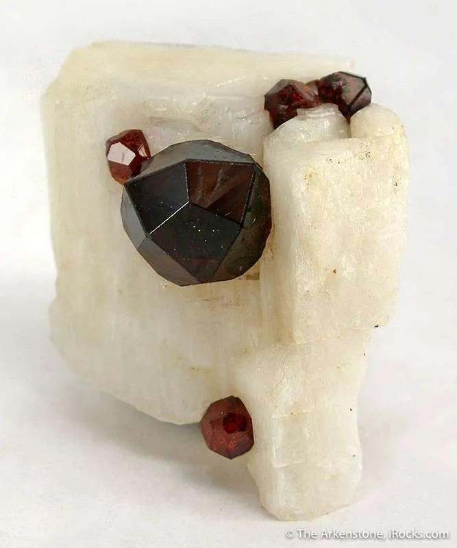 Spessartine on Feldspar image