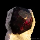 Spessartine on Quartz - image 1