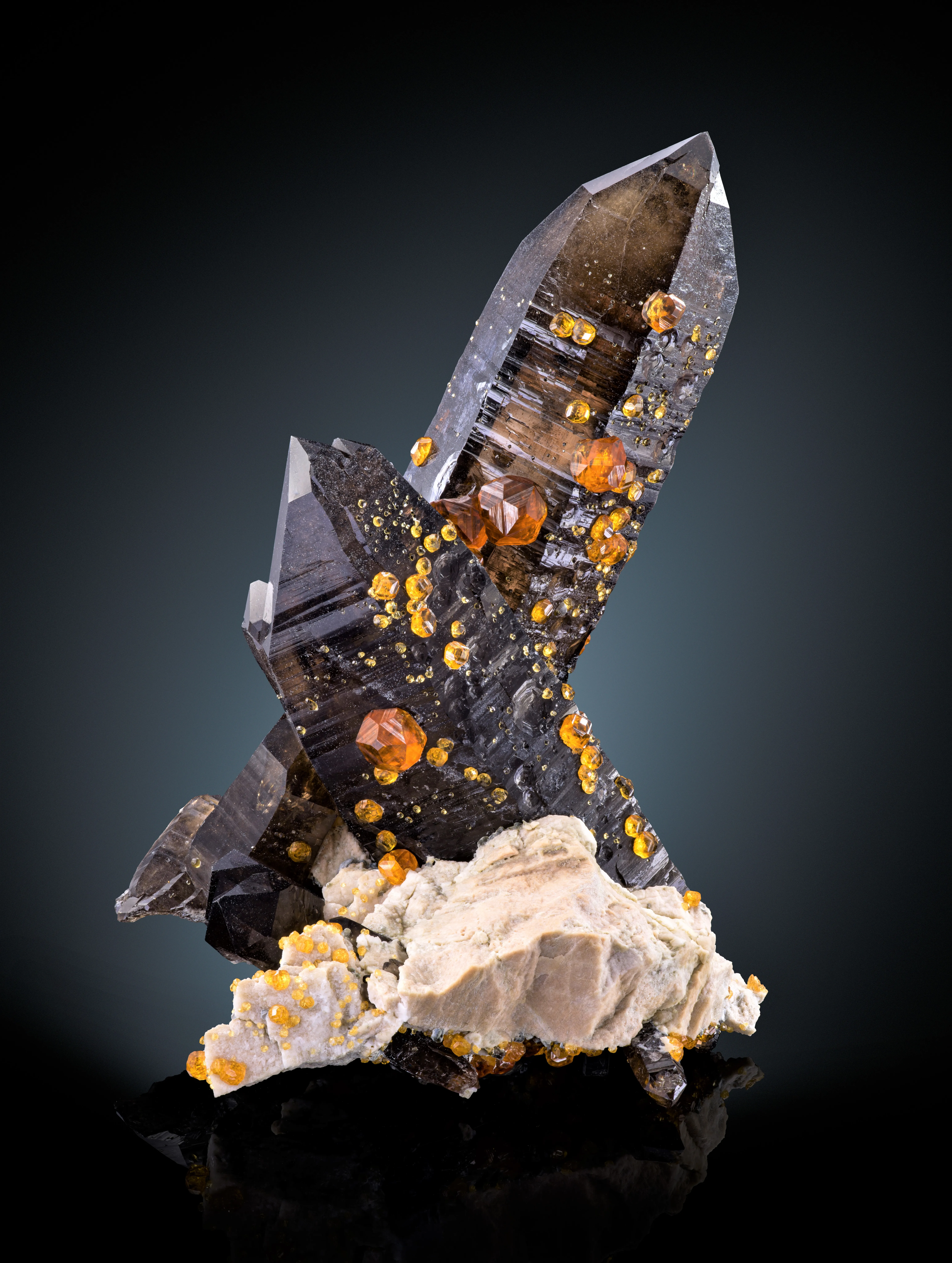 Spessartine on smoky quartz - image 1