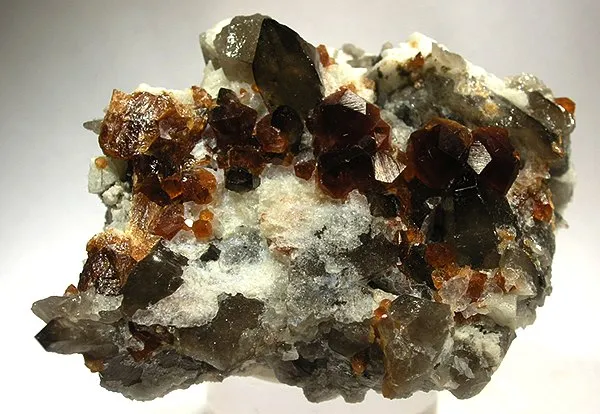 Spessartine, Quartz (Var: Smoky Quartz) - image 1