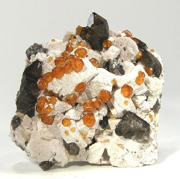 Spessartine, Quartz (Var: Smoky Quartz) image