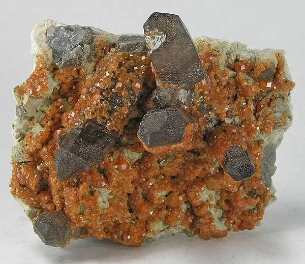 Spessartine, Quartz (Var: Smoky Quartz) image