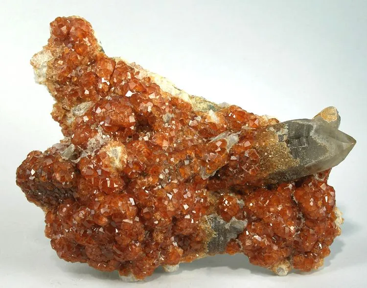 Spessartine, Quartz (Var: Smoky Quartz) image