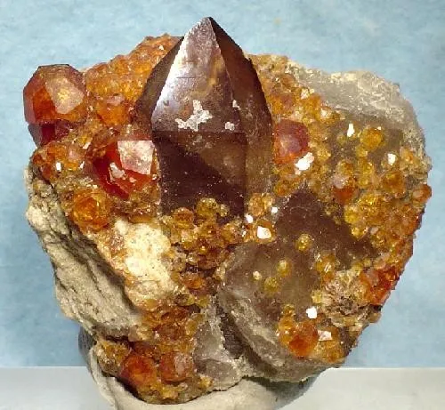 Spessartine, Quartz (Var: Smoky Quartz) image