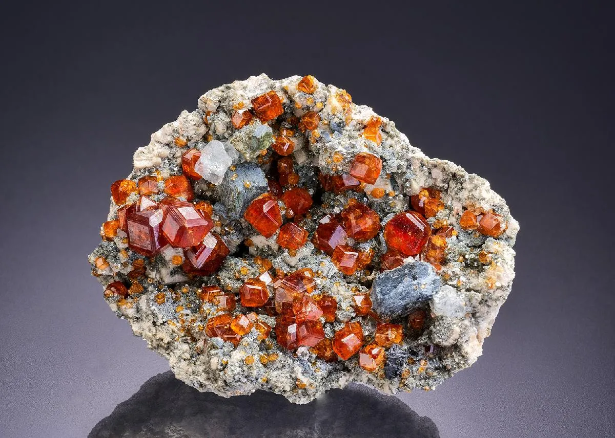 Spessartine with Fluorite on Muscovite and Microcline - image 1