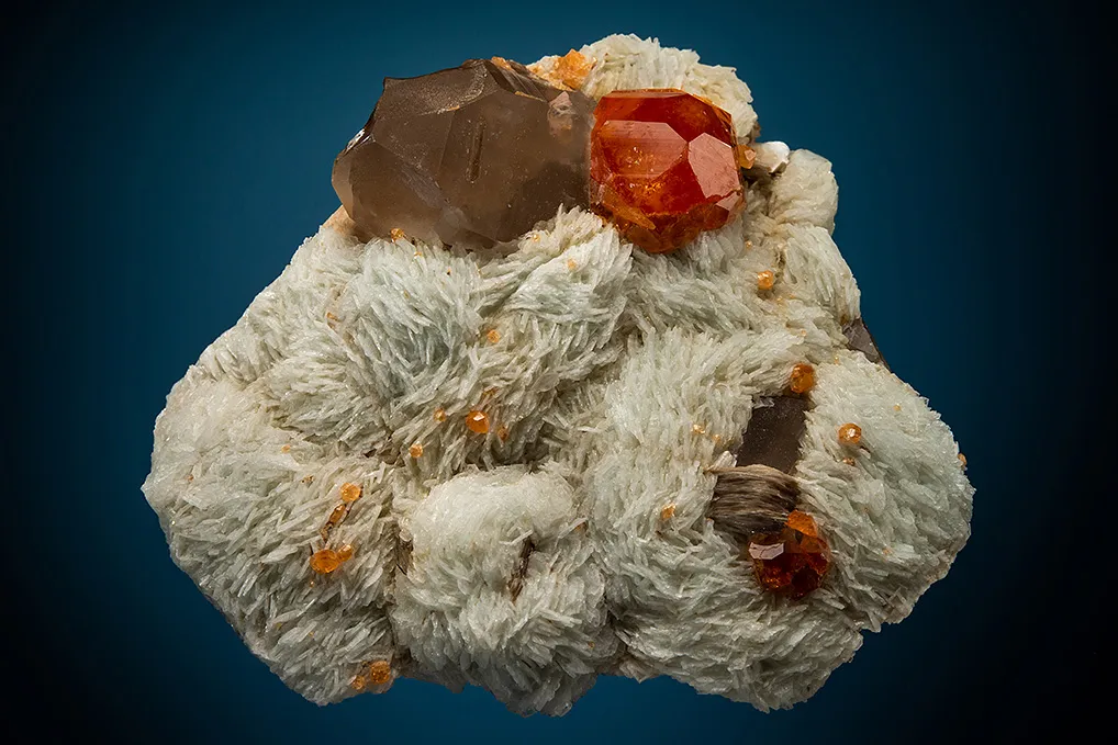 Spessartine with Quartz var. Smoky on Albite var. Cleavelandite image