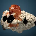 Spessartine with Schorl and Albite var. Cleavelandite - image 3