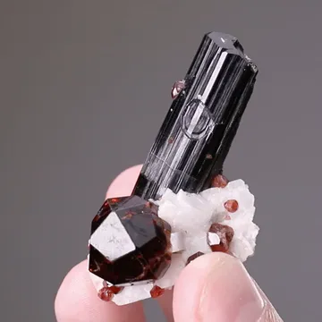 Spessartine with Schorl and Feldspar