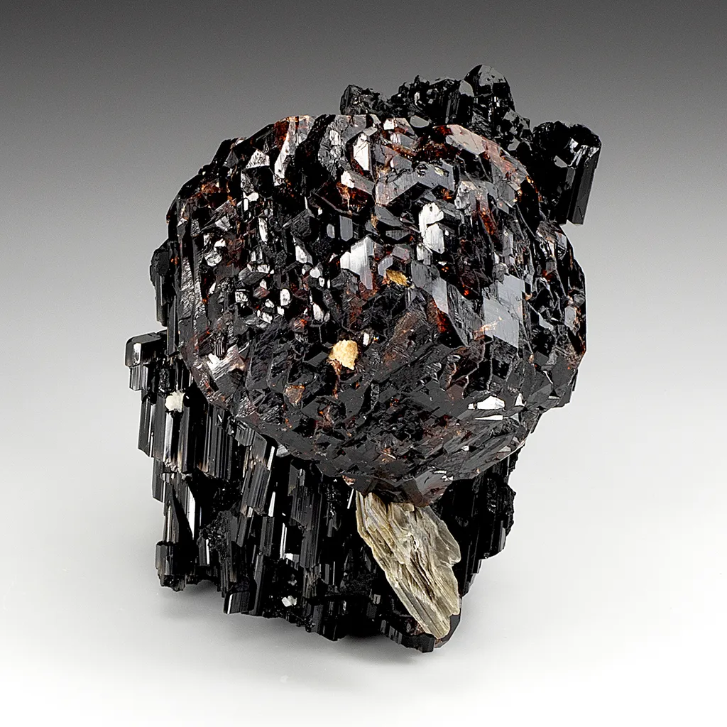 Spessartine with Schorl, Muscovite image