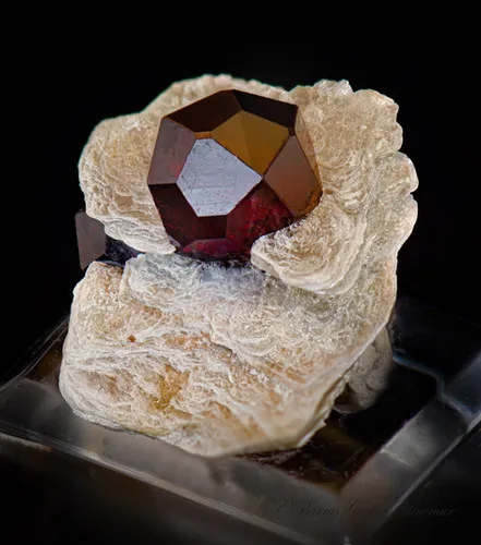 Spessartite Garnet on Mica image