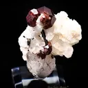 Spessartite Garnet on Orthoclase - image 3