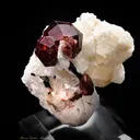 Spessartite Garnet on Orthoclase - image 1