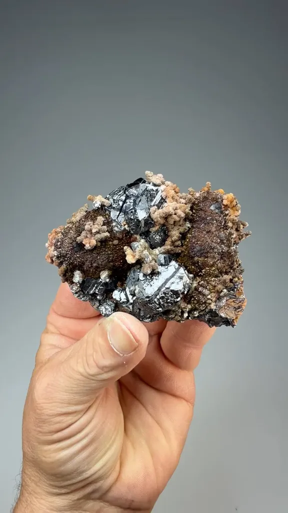 Sphalerite with Siderite on Pyrite after Pyrrhotite with Calcite image