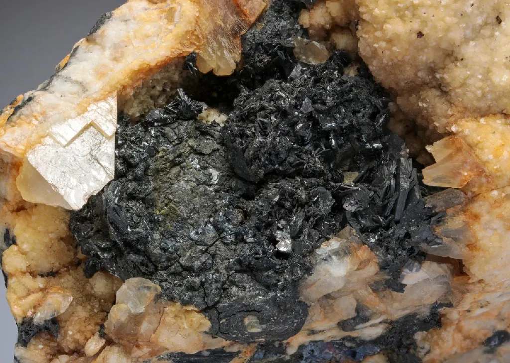 Sternbergite with Calcite image