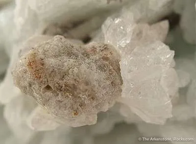 Stokesite With Stannomicrolite on Albite - image 2