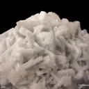 Strontianite (fl) on Baryte on Fluorite - image 5