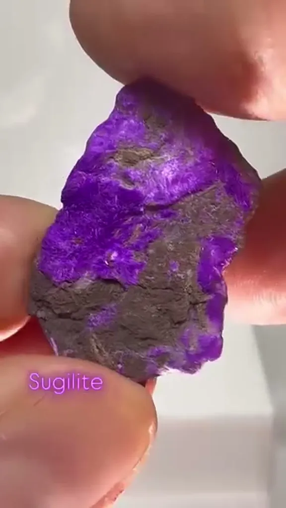 Sugilite is a purple, pink, or occasionally colorless mineral with a… image