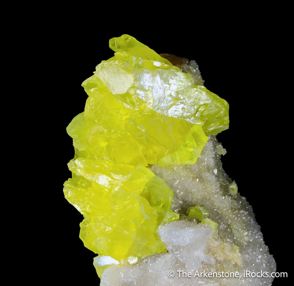 Sulphur (rare sphenoidal habit) on Calcite image