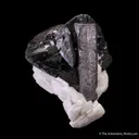 Tantalite-(Fe) with Cassiterite on Albite - image 1