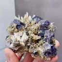 The Natural Purple Phantom Fluorite and Quartz coexist comes from Huanggangliang,Inner Mongolia 85*55*65MM - image 2