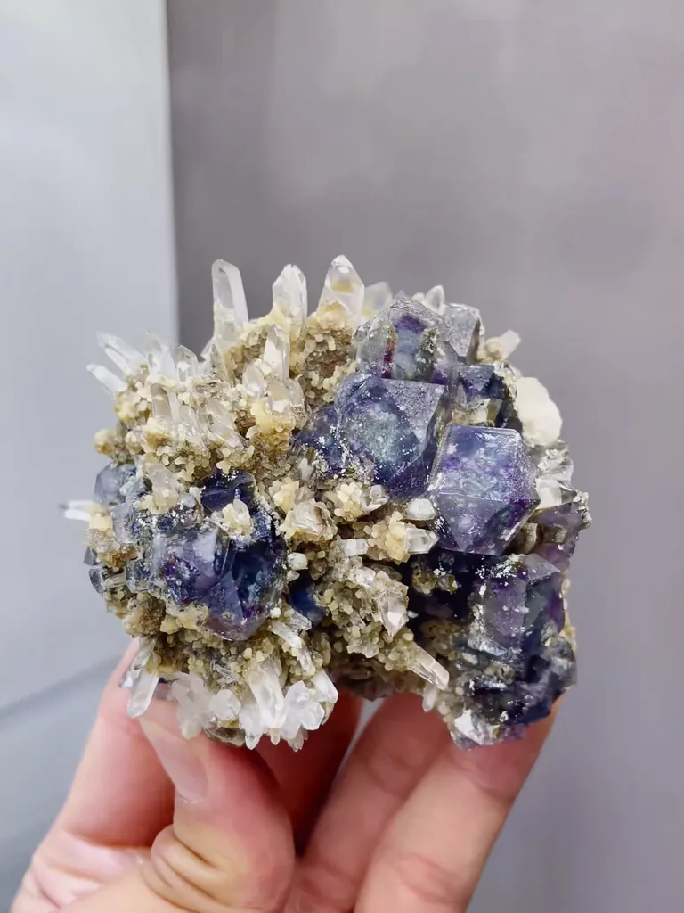 The Natural Purple Phantom Fluorite and Quartz coexist comes from Huanggangliang,Inner Mongolia 85*55*65MM image