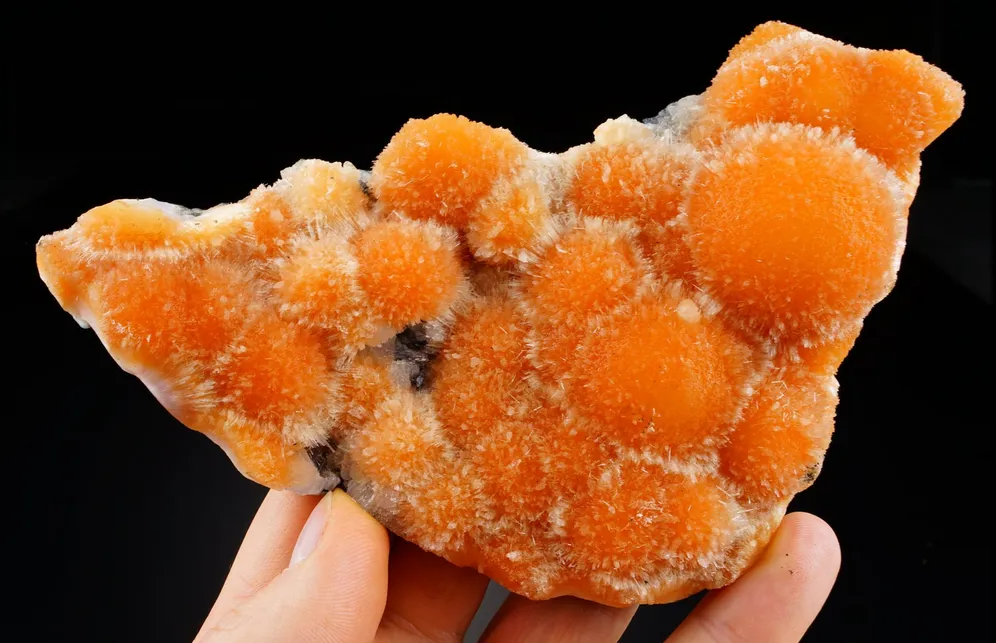 Thompsonite, intense orange sprays on Stilbite matrix image
