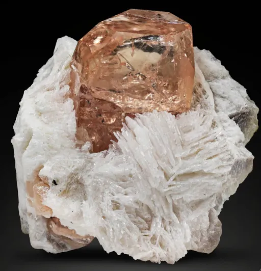 Topaz, peach colored, in Clevelandite matrix