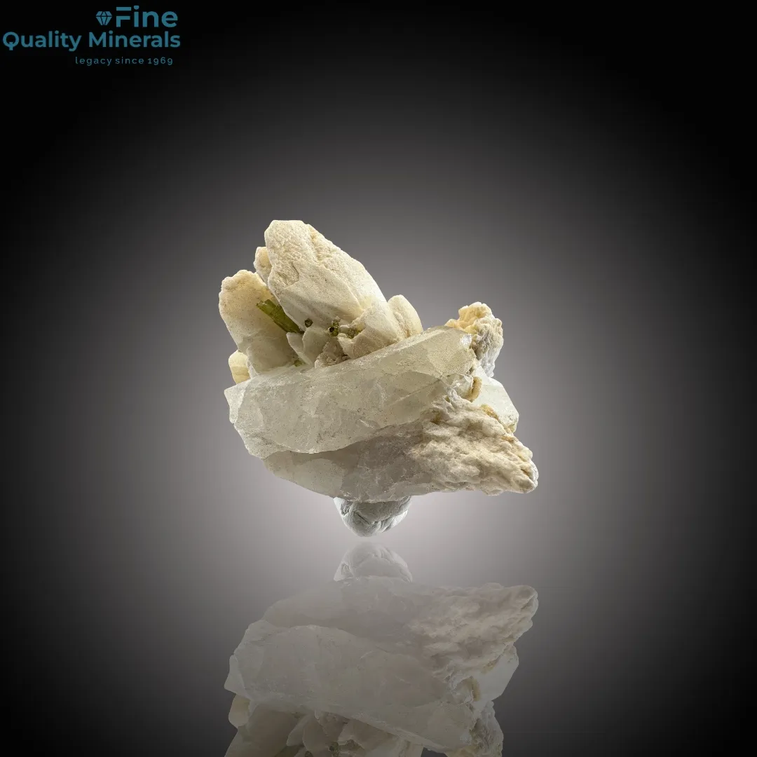 Tourmaline and Quartz Gracefully Nestled on Feldspar - image 1