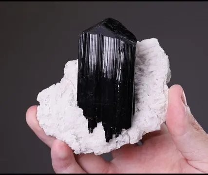 Tourmaline on Microcline