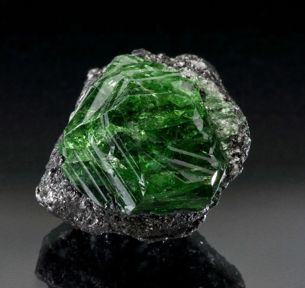 Tsavorite Garnet on Graphite image