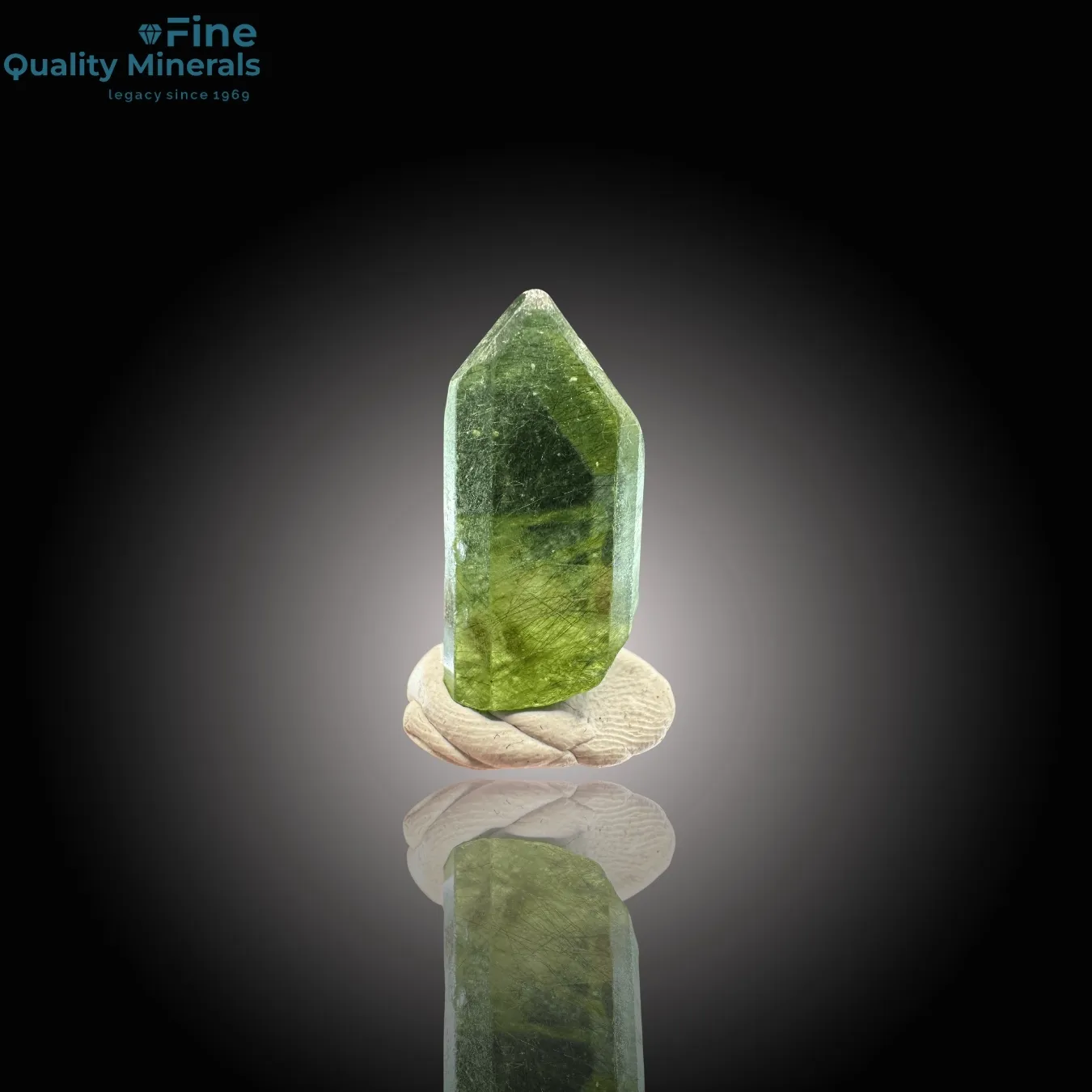 Vibrant Peridot Crystal with Rutile Inclusions - image 1