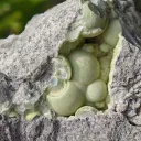 Wavellite from Arkansas, USA. Lime green wavellite spheres and slightly lustrous, with a strong and defined crystal structure - image 2
