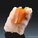 Wulfenite, Calcite on Quartz - image 1