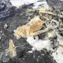 Wulfenite var. Chillagite with Barite, Cerussite - image 1