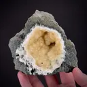 Yellow Prehnite in basalt pocket - image 1