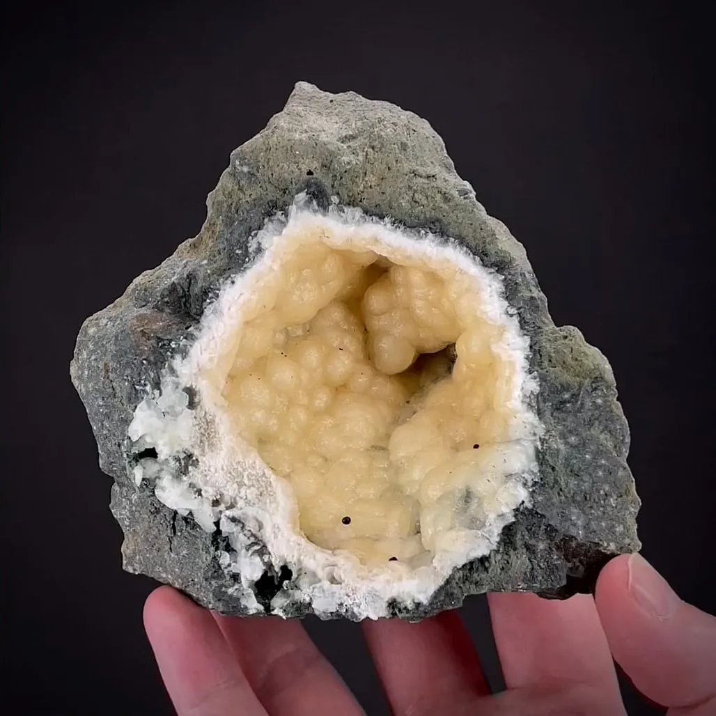 Yellow Prehnite in basalt pocket - image 1