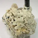 Zektzerite (Tl) & Arfvedsonite on Feldspar - image 1