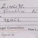 Zincite (co-type locality) on Franklinite - image 5