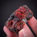 Zincite (co-type locality) on Franklinite - image 2